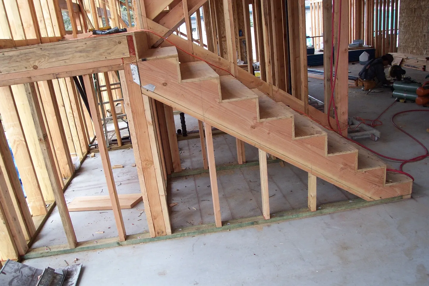 A view of stairs in the middle of construction.